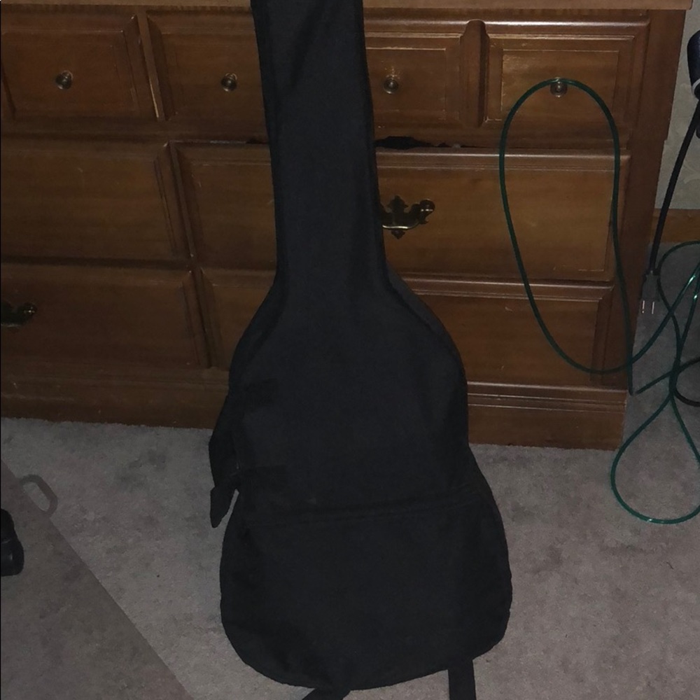 Guitar w case and books
